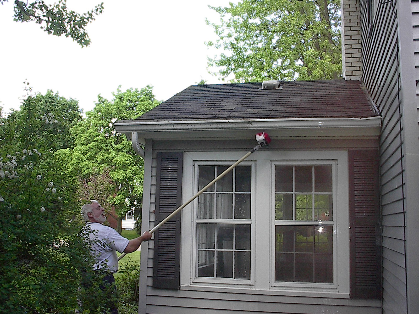 While we all know why a clean home is important, we might not know how to keep it clean. If you want to sell, is your home making the most of its “first impression” potential? Home Team Power Clean is western Michigan’s resource for a house washing service that puts your property on the map and helps it stand out above the other homes in your neighborhood. A New Level Of Clean A beautiful property can get hidden behind a layer of dirt and grime. Our house washing service is a great option for any exterior – vinyl, composite, wood, stone, and stucco – Home Team provides the appearance that most homeowners yearn for. Home Team delivers successful results thanks to our complete commitment to quality. All of the technology, cleaners, and equipment at your property will be cutting edge. And they’ll be deployed by a team who knows how to safely restore your exterior for 20 years and running. Behind Our Process We care about the long-term value of your home exterior. That’s why, instead of a conventional pressure washing service, we have a soft washing system designed to combat dirt without the forceful impact. Cutting Edge Technology: Our state-of-the-art mobile system dispels water at high and low pressure with finesse to: Remove dirt, dust, and grit Kill and remove algae, mold, and mildew Eliminate stains, streaks and cobwebs With water softening technology, plant-friendly detergents that actually clean your home, the sky’s the limit when it comes to our cleaning capabilities. Our goal is to create a beautiful home for every customer. With our house washing service, that first impression is yours for the taking. Most Home Team clients will tell us: “My home has never looked this good before!”